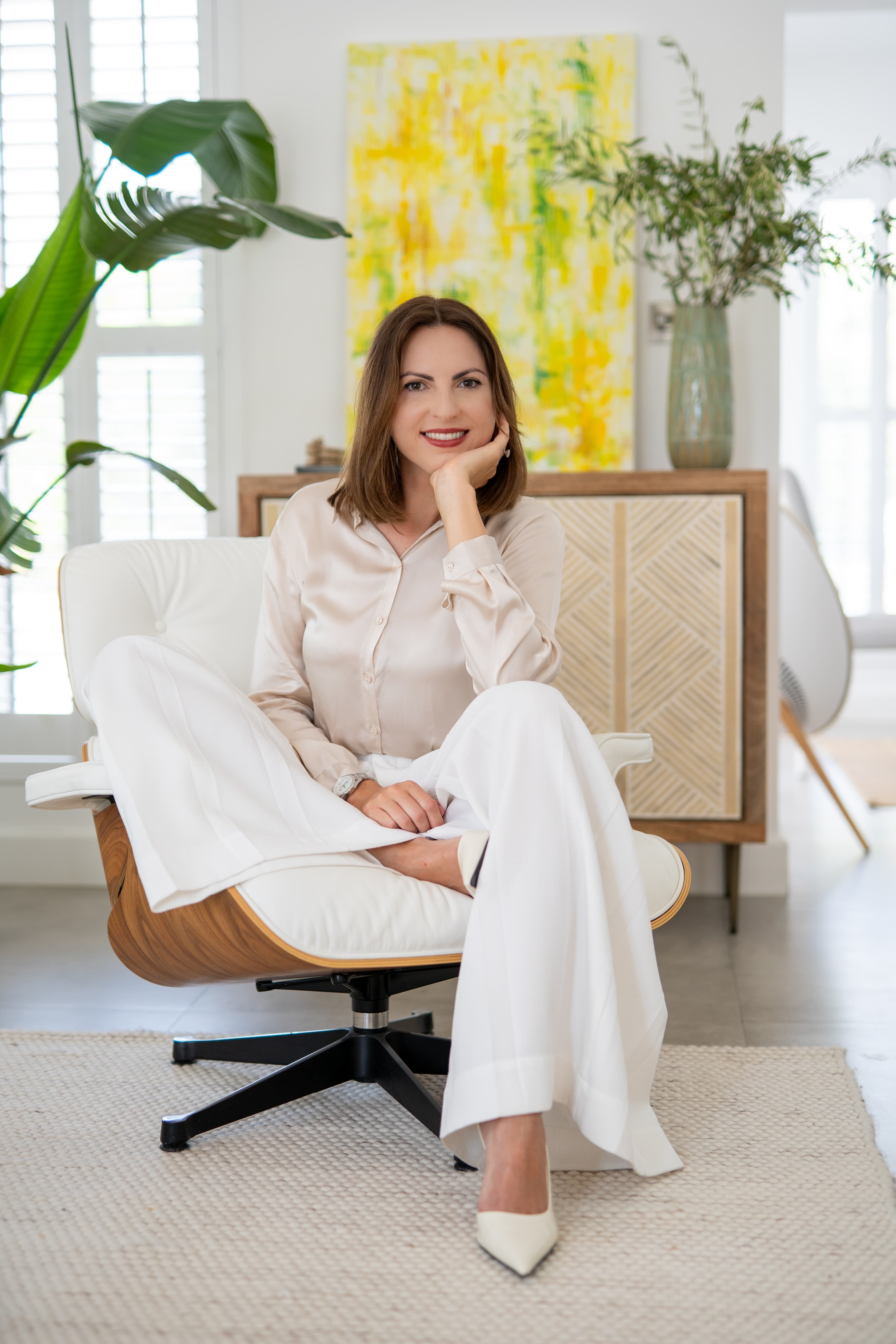 Karolina Sowa sitting in a chair